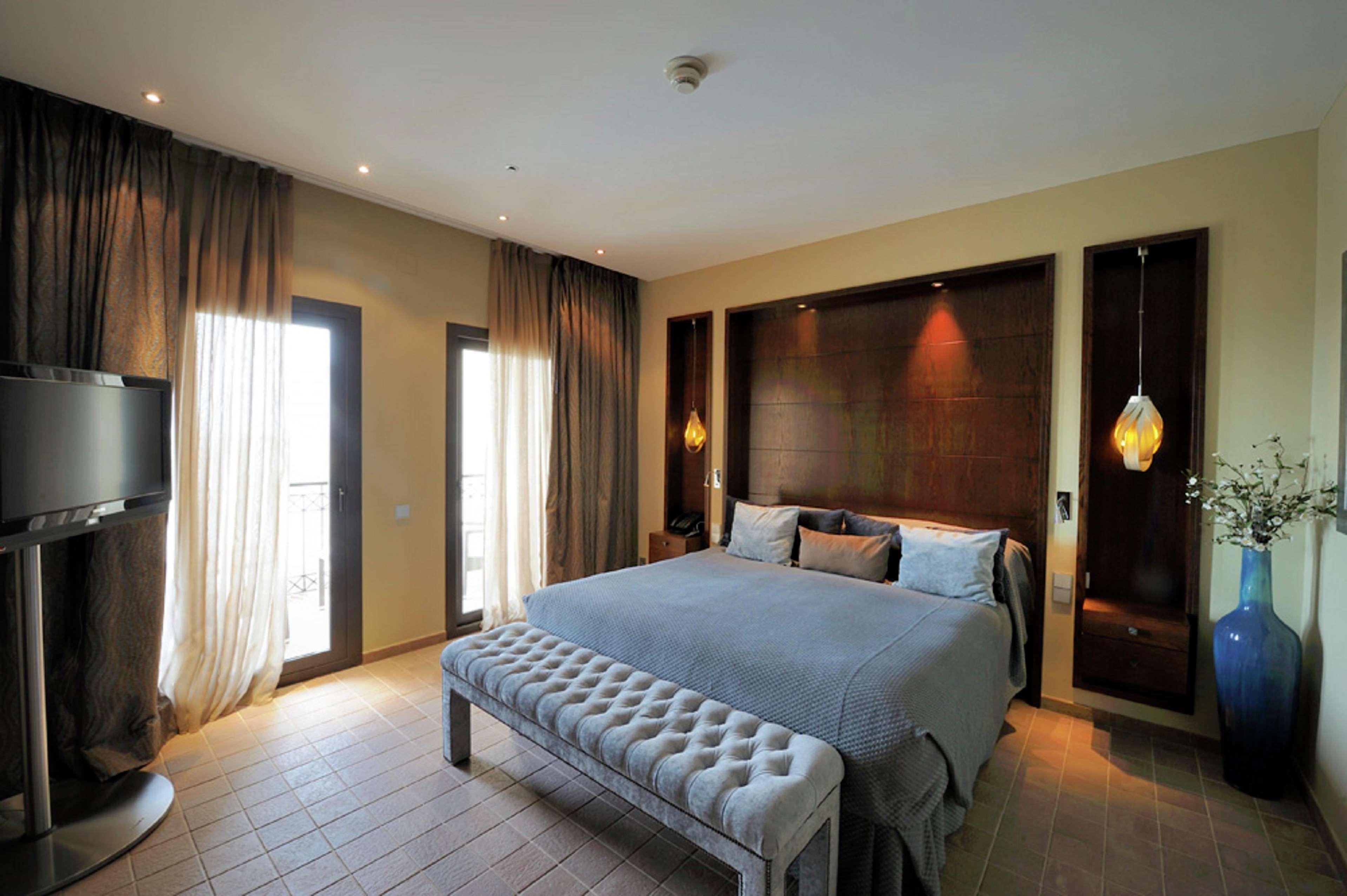 Doubletree By Hilton La Torre Golf Resort Roldán Exterior foto A bedroom at the hotel