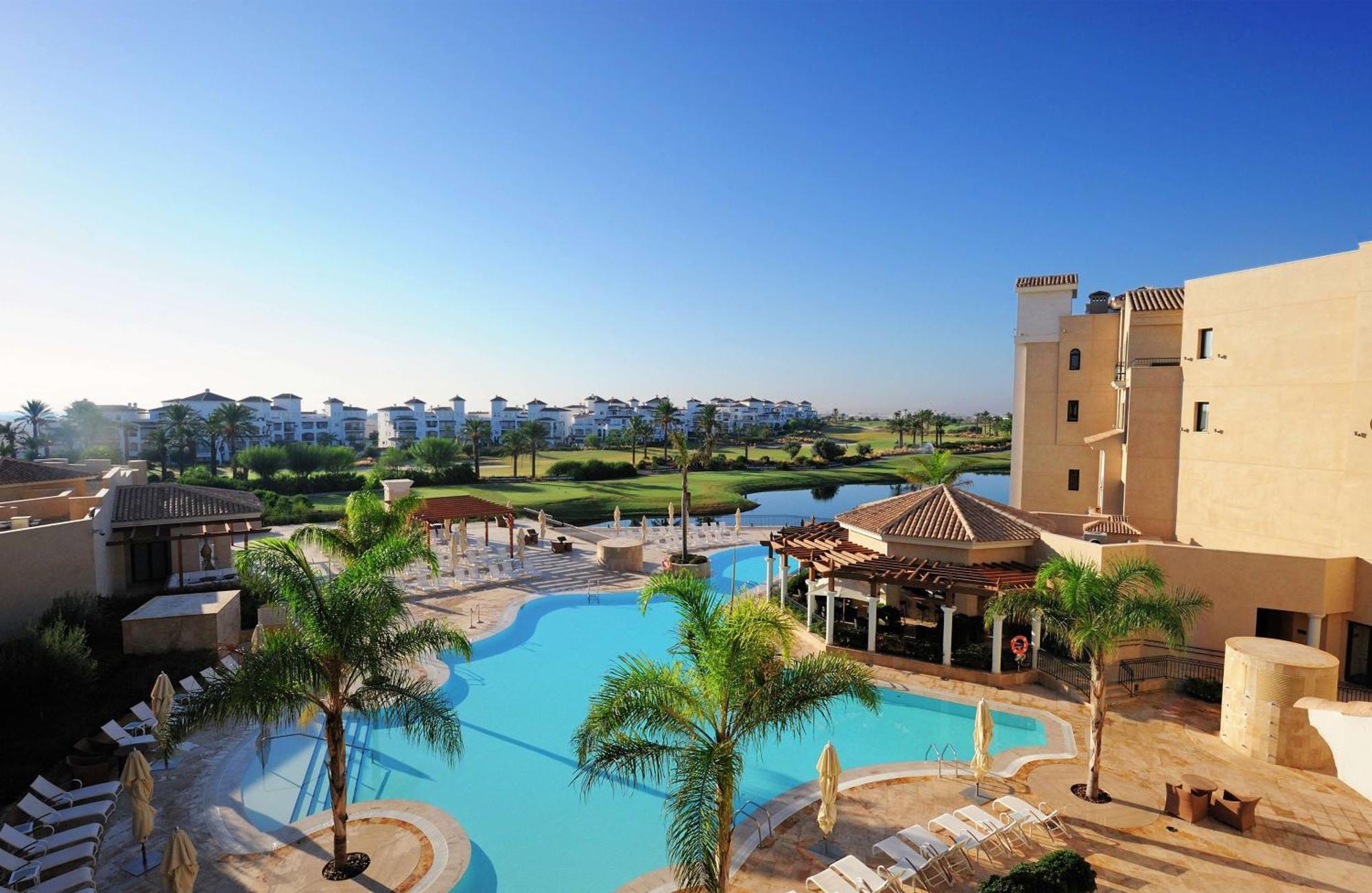 Doubletree By Hilton La Torre Golf Resort Roldán Exterior foto View of the pool at the clubhouse